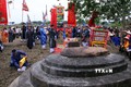 Nghi lễ xin rước Thần Nông từ Cồn Thần về đình Thần Nông tại Lễ hội Mục đồng làng Phong Lệ. Ảnh: Trần Lê Lâm - TTXVN