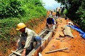 Xây dựng công trình phúc lợi xã hội ở huyện Bát Xát, Lào Cai. Ảnh: Thanh Hà/TTXVN