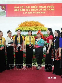 Các đại biểu trong trang phục truyền thống đến dự Đại hội. Ảnh: Dương Giang - TTXVN

