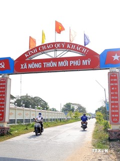 Xã Phú Mỹ đạt chuẩn nông thôn mới trên vùng biên giới huyện Giang Thành (Kiên Giang). Ảnh: Hồng Đạt - TTXVN
