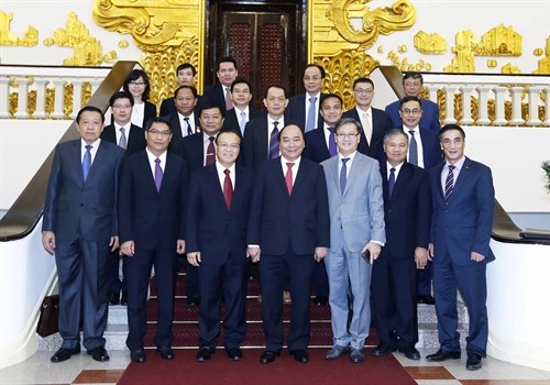 Thủ tướng Nguyễn Xuân Phúc tiếp Phó Thủ tướng, Bộ trưởng Tài chính Lào