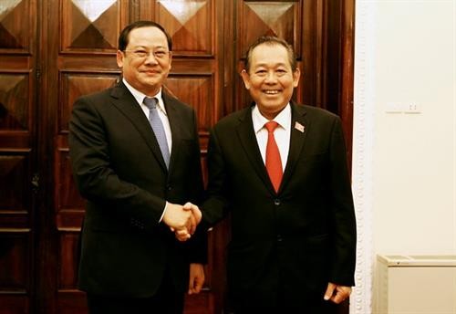 越南政府副总理张和平与老挝政府副总理宋赛 • 西潘敦举行会谈