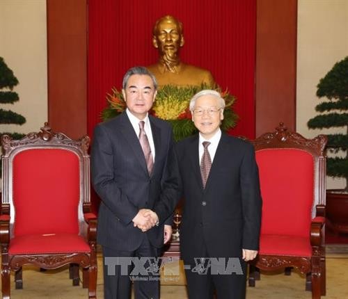 越共中央总书记阮富仲会见中国外交部长王毅。（图片来源：越通社）