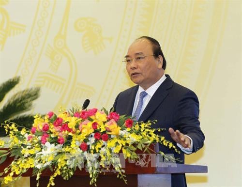 政府总理阮春福：提高单位领导人和个人在落实2018年经济社会任务的责任意识