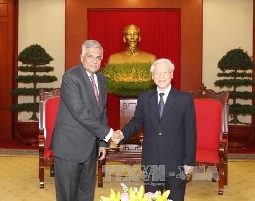 越南党和国家领导分别会见斯里兰卡总理拉尼尔·维克勒马辛哈