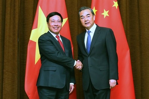 越南政府副总理兼外交部长范平明同中国外交部长王毅举行会谈