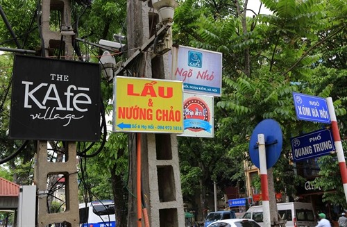Chuyển biến trong xử lý vi phạm biển hiệu, bảng quảng cáo ở Hà Nội