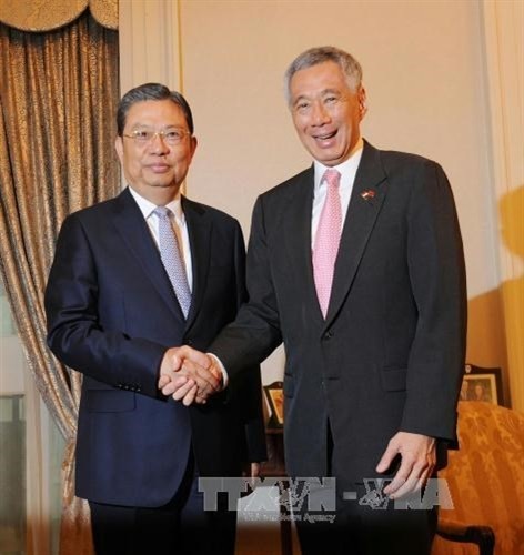 新加坡承诺积极推动东盟与中国关系不断向前发展