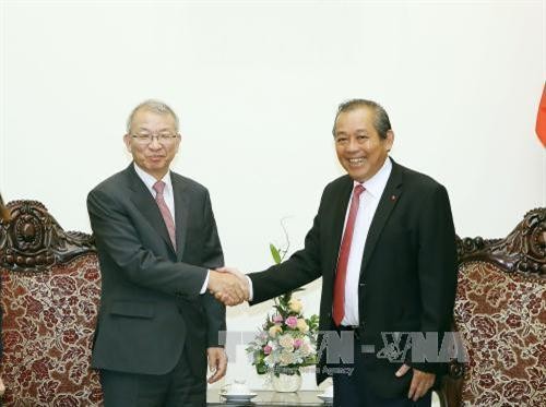 越南政府常务副总理张和平会见韩国大法院院长梁承泰
