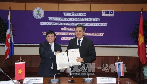 越南通讯社与泰国公共关系部一致同意加强合作关系