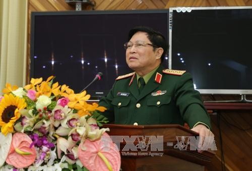 越南高级军事代表团对老挝进行正式访问