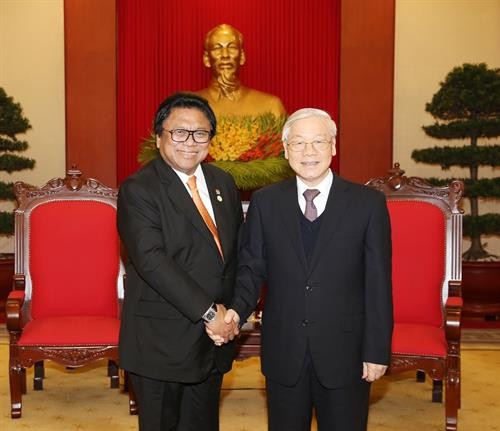 越共中央总书记阮富仲与越南国家主席陈大光会见印尼地方代表理事会主席乌斯曼