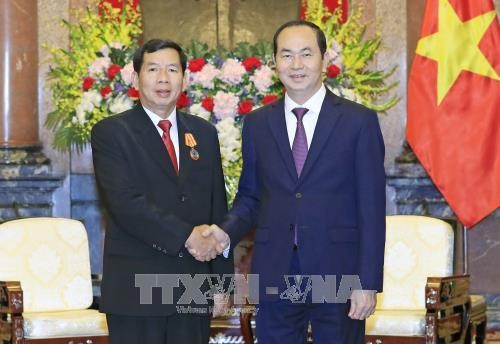 越南国家主席陈大光会见老挝最高人民法院院长坎潘·西提丹帕
