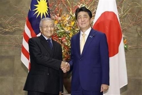日本首相与马来西亚总理会谈