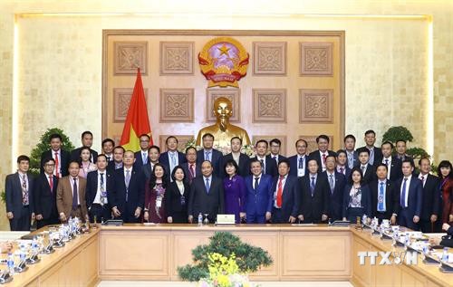 政府总理阮春福会见获得2018年国家驰名品牌的企业代表