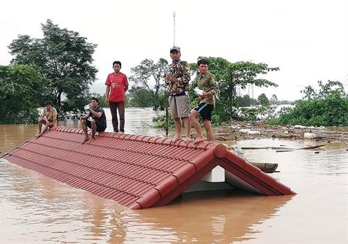 老挝一水电站大坝坍塌 越南领导人为此致慰问电