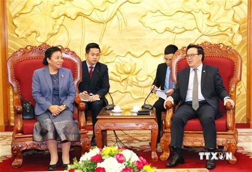 越共中央对外部部长黄平君会见老挝革命人民党中央对外部代表团