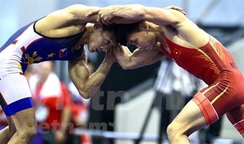 第30届东运会：越南摔跤运动员今日夺得三枚金牌