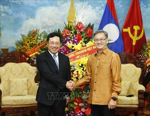 老挝迎来传统新年 越南政府副总理范平明送祝福