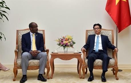 越南政府副总理武德儋会见塞舌尔副总统文森特·梅里顿