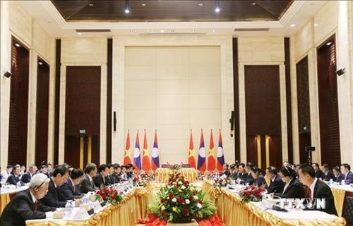 越南政府副总理郑廷勇访问老挝