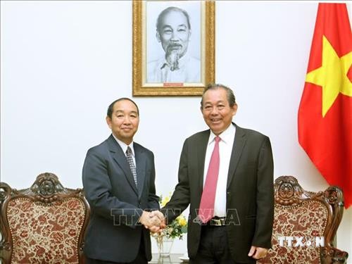 政府常务副总理张和平会见老挝最高人民法院院长坎帕•森达拉