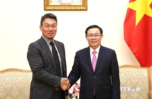 越南政府副总理王廷惠：致力于完善越南无现金支付体系