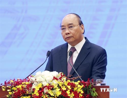 越南政府总理阮春福： 越南经济就像被压缩的弹簧 越压后续反弹越强烈