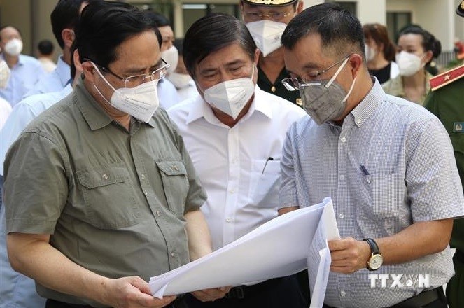 范明政总理：从现在到月底将有至少200万剂新冠疫苗到达胡志明市