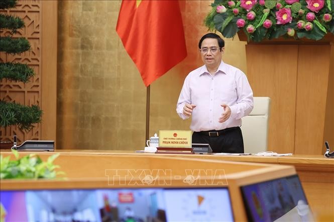 越南政府总理范明政：最迟9月30日，坚江省和前江省必须成功管控新冠疫情