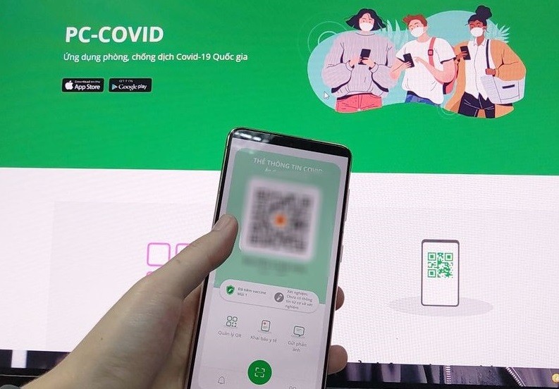 胡志明市使用PC-COVID应用参与社会经济活动