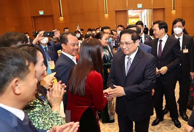 政府总理范明政：越南根源一直存在于旅居世界各地越南人心中