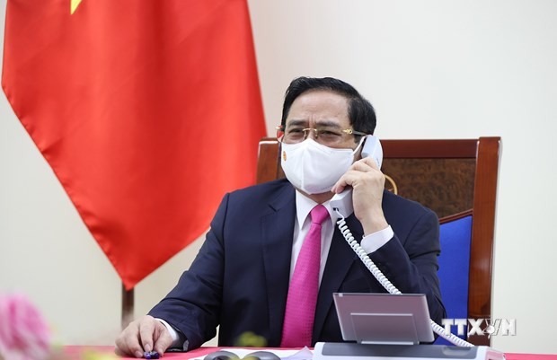  越南政府总理范明政与日本首相菅义伟通电话