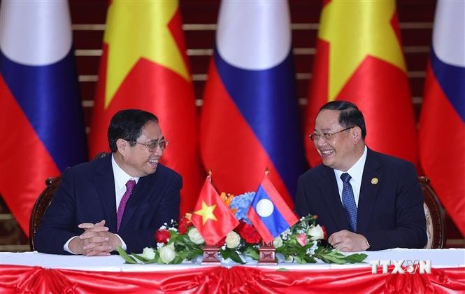 越南政府总理范明政圆满结束对老挝的正式访问