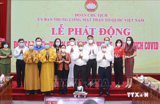 Chủ tịch nước Nguyễn Xuân Phúc và các đại biểu tham dự Lễ phát động. Ảnh: Thống Nhất – TTXVN