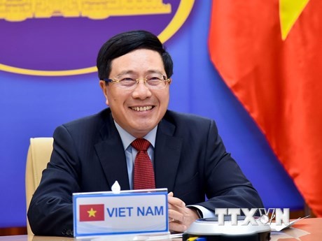 越南政府副总理兼外长范平明与沙特阿拉伯外交大臣费萨尔通电话