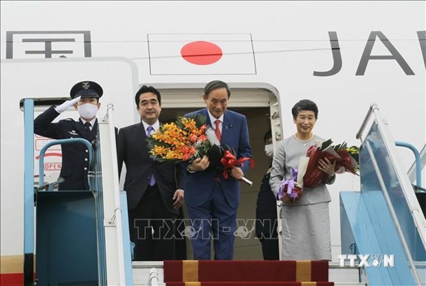 日本首相菅义伟圆满结束对越南的正式访问