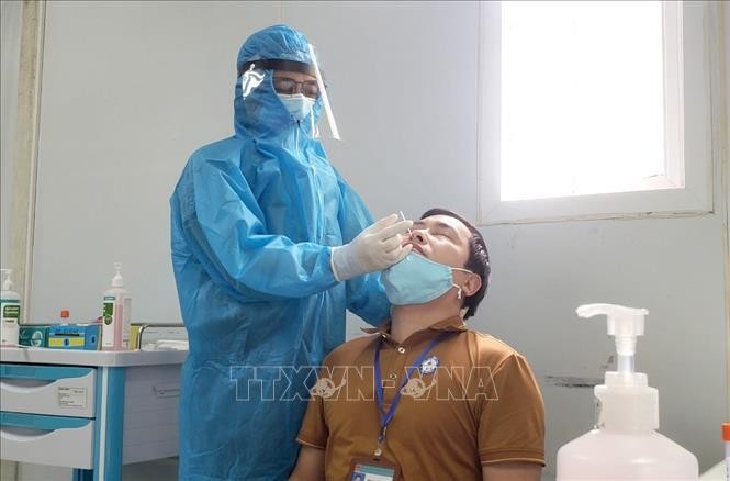 新冠肺炎疫情：22日上午越南报告新增本土确诊病例20例