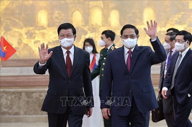 越南政府总理范明政会见老挝人民革命党总书记、国家主席通伦