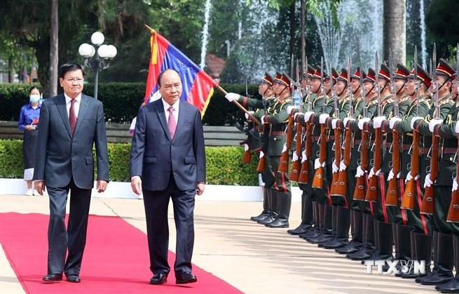老挝总书记、国家主席以最高礼遇欢迎越南国家主席阮春福一行访问