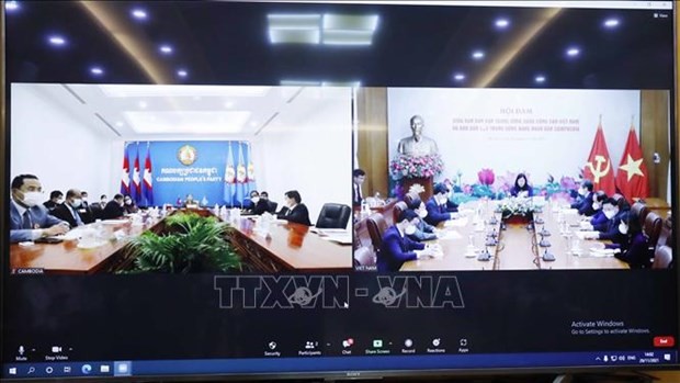 越南共产党中央民运部与柬埔寨人民党中央民运部进行线上会谈