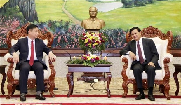 老挝党和国家领导人会见越共中央宣教部代表团