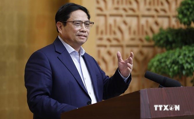 越南政府总理范明政：坚定不移保持宏观经济稳定 积极促进经济增长目标