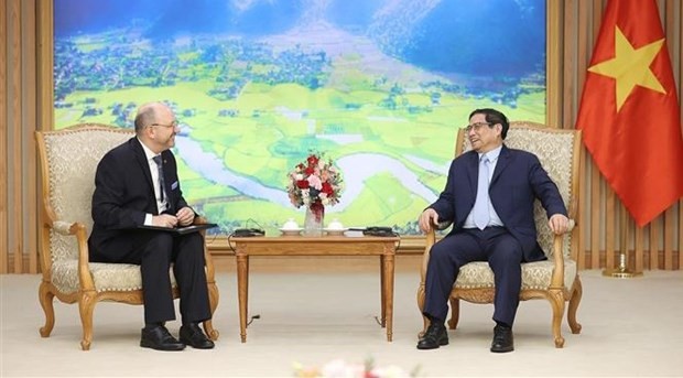 政府总理范明政会见瑞士驻越南大使