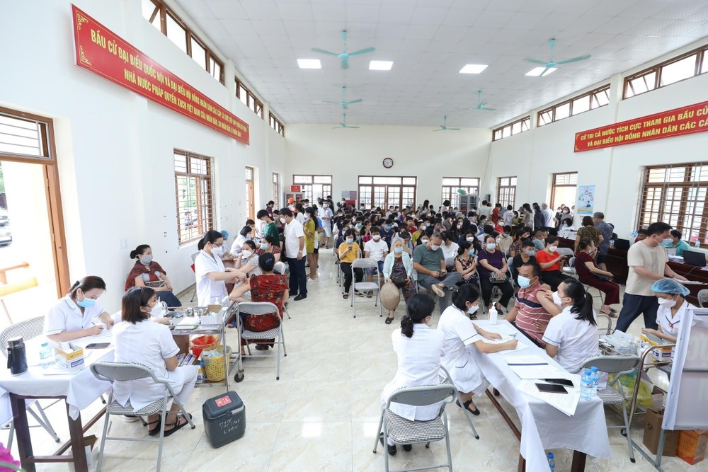 Tiêm vaccine phòng dịch COVID-19 tại điểm tiêm Nhà văn hóa khối Đại Thắng, phường Chi Lăng, thành phố Lạng Sơn. Ảnh: Anh Tuấn – TTXVN