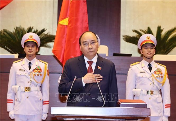 Chủ tịch nước Nguyễn Xuân Phúc tuyên thệ nhậm chức. Ảnh: TTXVN