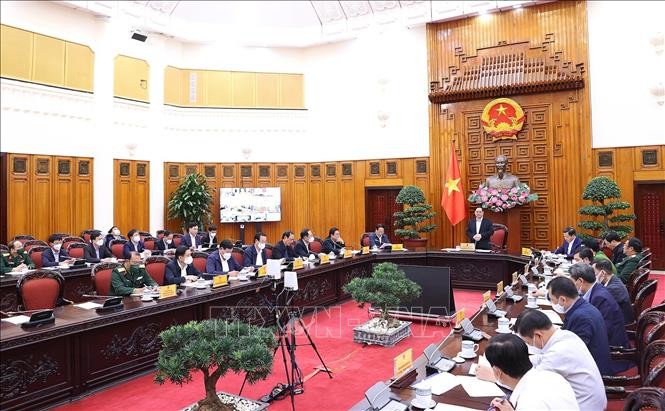Thủ tướng Phạm Minh Chính chủ trì cuộc họp. Ảnh: Dương Giang-TTXVN