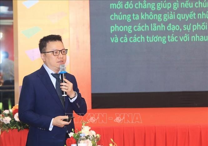 Chủ tịch Hội Nhà báo Việt Nam, Tổng biên tập báo Nhân dân Lê Quốc Minh phát biểu tại diễn đàn"Vấn đề hôm nay: Chuyển đổi số" để phục vụ bạn đọc tốt hơn . Ảnh: Tuấn Anh – TTXVN