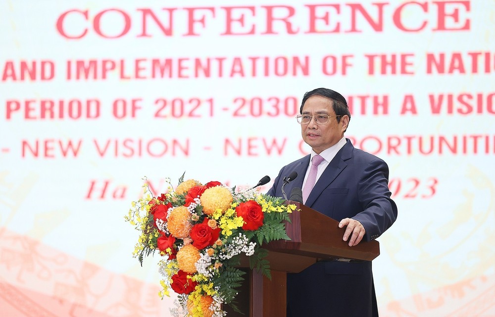Thủ tướng Phạm Minh Chính đến dự Hội nghị công bố và triển khai Quy hoạch tổng thể quốc gia thời kỳ 2021-2030. Ảnh: Dương Giang-TTXVN
