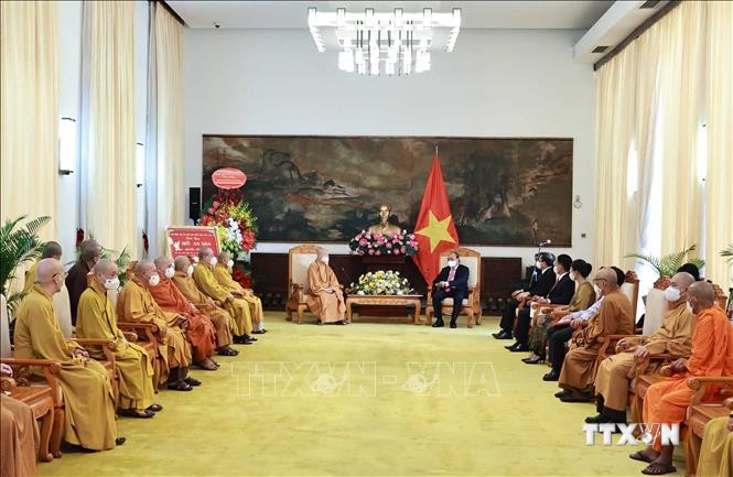 Chủ tịch nước Nguyễn Xuân Phúc với các đại biểu tại buổi tiếp. Ảnh: Thống Nhất – TTXVN